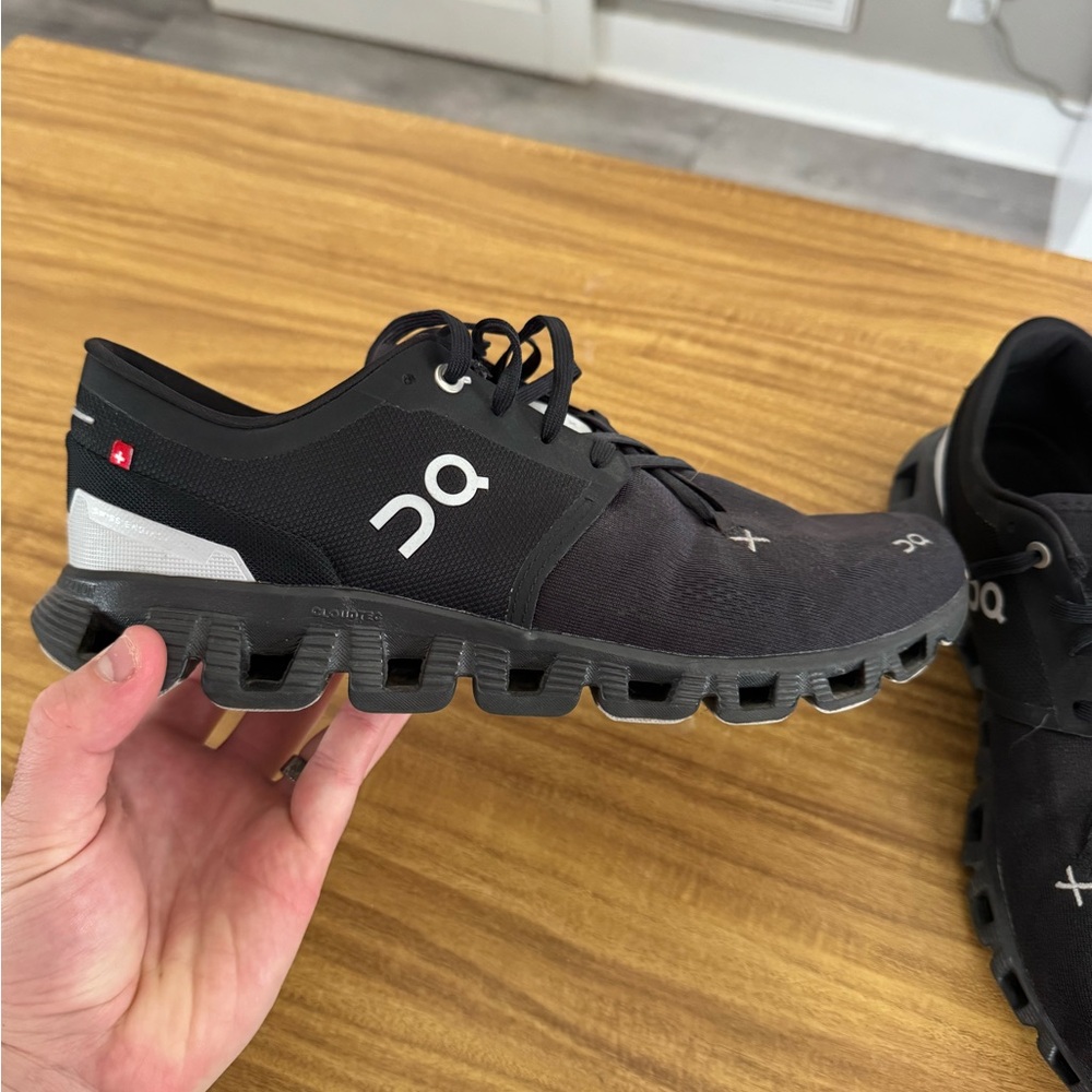 On Running Black and Gray Athletic Shoes with CloudTec Cushioning